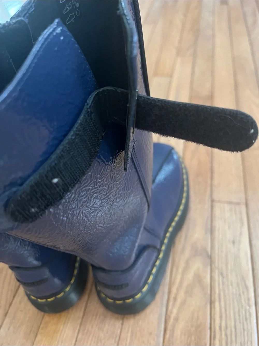 Dr Martens women’s BUZZ HI DISTRESSED PATENT BOOTS